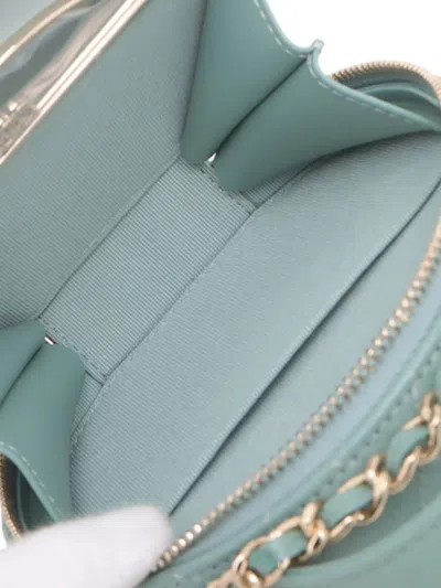Pre-owned Chanel 2021 Quilted Caviar Handle With Care Round Vanity Case With Chain Satchel In Green