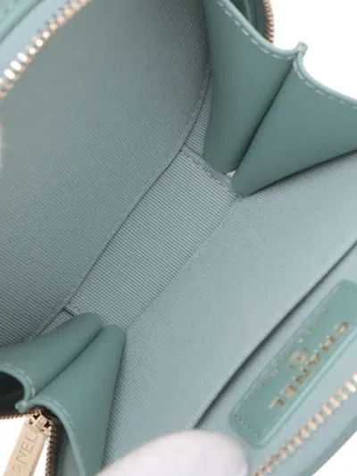 Pre-owned Chanel 2021 Quilted Caviar Handle With Care Round Vanity Case With Chain Satchel In Green