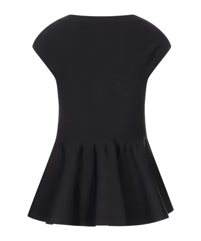 Alaïa Knitted Skater Dress In Black