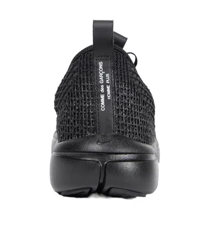 Comme Des Garçons Textured Black Sneakers With Low-profile Design And Distinctive Branding In Black