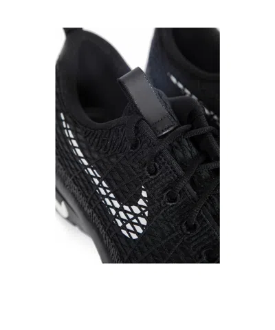 Comme Des Garçons Textured Black Sneakers With Low-profile Design And Distinctive Branding In Black