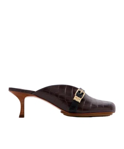 Ganni Sue Heeled Croco Mules Chocolate Fondant In Black