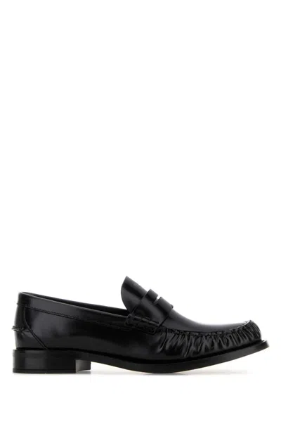 Prada Leather Loafers With Penny Strap And Round Toe In Black