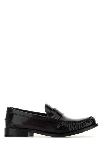 Prada Leather Loafers With Penny Strap And Round Toe In Black