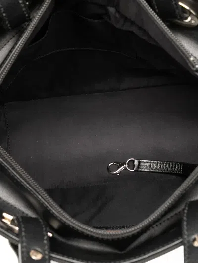 Pre-owned Chanel 2010-2011 Small Quilted Coated Canvas Paris Biarritz Tote Bag