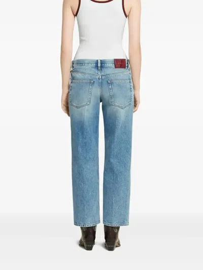 Gucci Blue Jeans With Logo Patch On The Rear And Faded Effect In Denim Woman