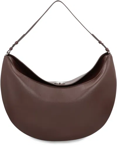 Jacquemus Le Calisso Rond Large Brown Shoulder Bag With Adjustable Strap And Embossed Logo In Leather Woman In Brown