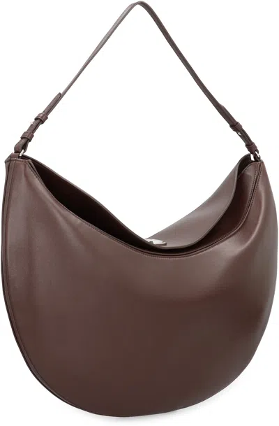 Jacquemus Le Calisso Rond Large Brown Shoulder Bag With Adjustable Strap And Embossed Logo In Leather Woman In Brown