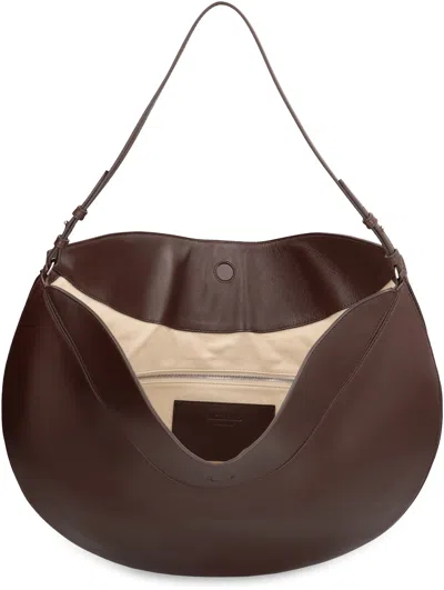 Jacquemus Le Calisso Rond Large Brown Shoulder Bag With Adjustable Strap And Embossed Logo In Leather Woman In Brown