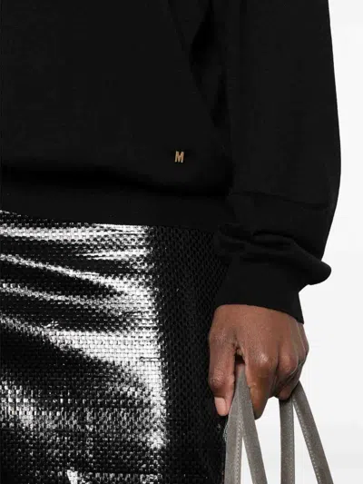 Moschino Sweaters In Black
