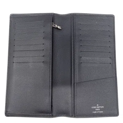 Pre-owned Louis Vuitton Black Taiga Leather Long Wallet (bi-fold) ()