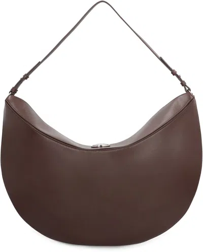 Jacquemus Le Calisso Rond Large Brown Shoulder Bag With Adjustable Strap And Embossed Logo In Leather Woman In Brown