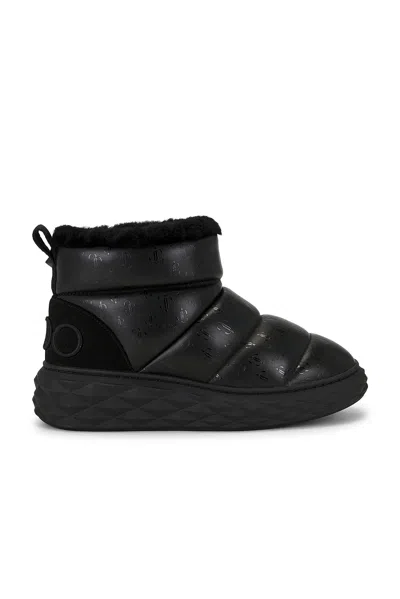 Jimmy Choo Xan Shearling-lined Quilted Logo-embossed Leather Boots In Black
