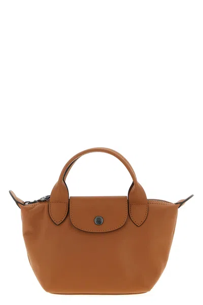 Longchamp Extra Small Le Pliage Xtra Leather Top Handle Bag In Brown