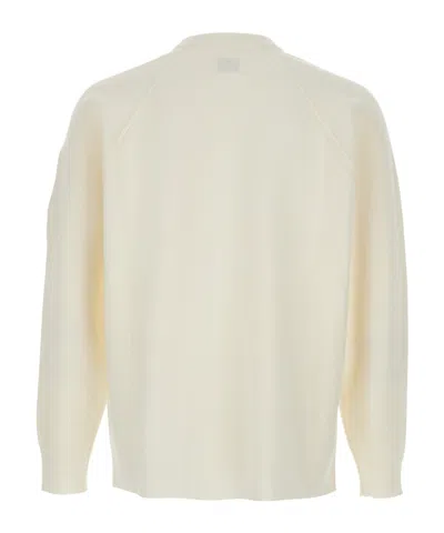 C.p. Company Men White Crewneck Sweater With Logo Plaque On The Sleeve In Wool Blend Man In White