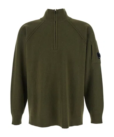 C.p. Company Men Green Turtleneck Sweater With Logo Plaque On The Sleeve In Wool Man In Green