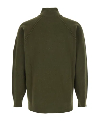 C.p. Company Men Green Turtleneck Sweater With Logo Plaque On The Sleeve In Wool Man In Green