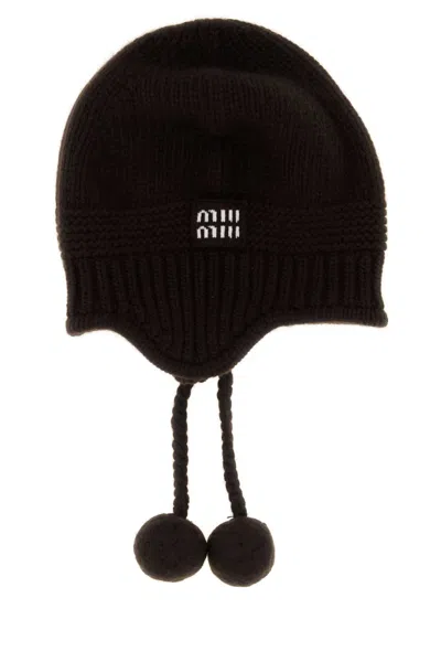 Miu Miu Knit Hat With Ear Flaps And Pom-poms In Brown