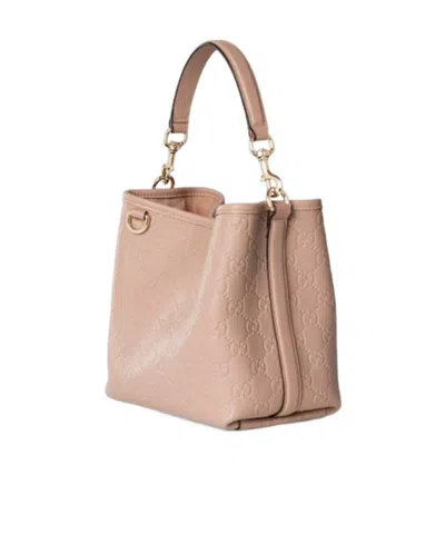 Gucci Gg Emblem Small Bucket Bag In Pink