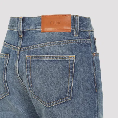 Chloé Women Blue Jeans With Wide Leg And Pendant Charm On The Front In Denim Woman In Blue