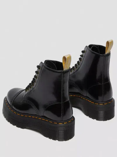 Dr. Martens Sinclair Combat Boot In Black Hammered Leather With A Large Treaded Sole