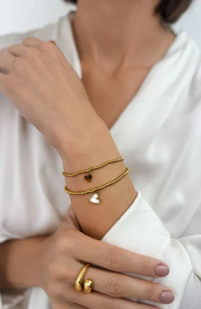Adornia Set Of 2 Heart Charm Stretch Beaded Bracelets In Gold