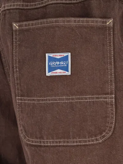 Gramicci Adjustable-waist Topstitched Jeans In Brown