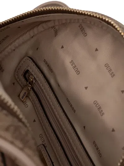 Guess Usa Monogram-pattern Zip-around Backpack In Brown