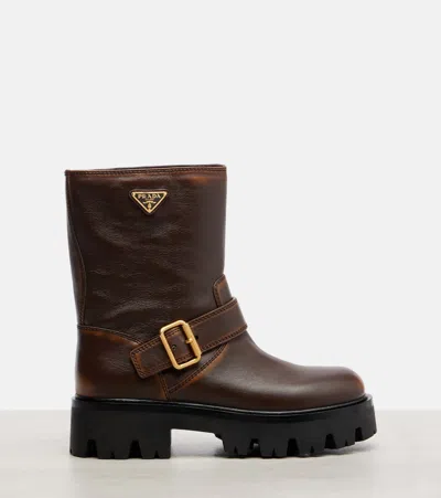 Prada Triangle Logo Distressed Leather Ankle Boots In Brown