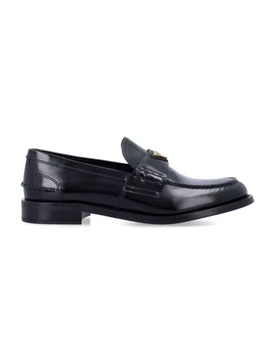 Prada Leather Loafers With Decorative Buckle And Round Toe In Black