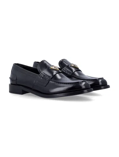 Prada Leather Loafers With Decorative Buckle And Round Toe In Black