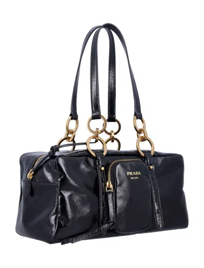 Prada Dangle Medium Leather Top-handle Bag In Black