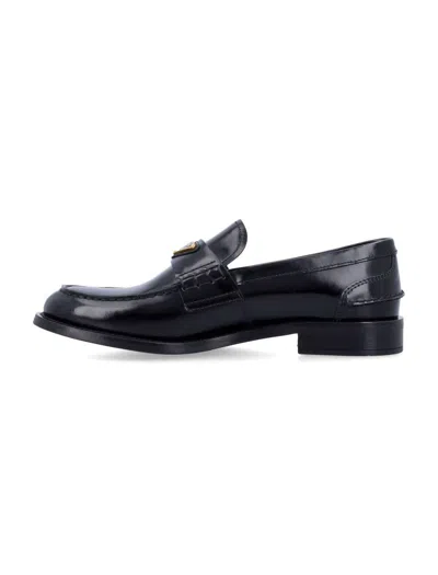 Prada Leather Loafers With Decorative Buckle And Round Toe In Black