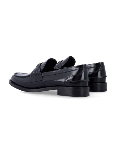 Prada Leather Loafers With Decorative Buckle And Round Toe In Black