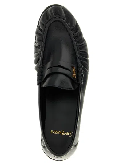Saint Laurent Cassandre Leather Loafers In Black