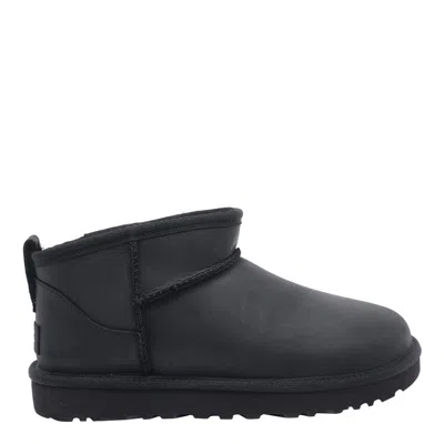 Ugg Classic Ultra Mini Black Ankle Boots With Shearling Lining In Leather Woman In Black