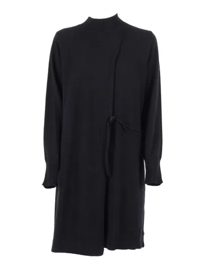 Kangra Cashmere Asymmetrical Wrap Dress With Side Tie Closure And Modern Hemline In Black