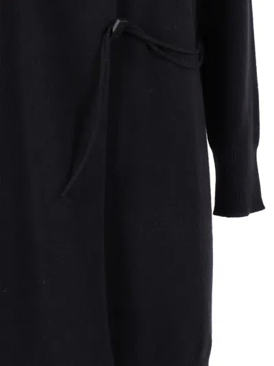 Kangra Cashmere Asymmetrical Wrap Dress With Side Tie Closure And Modern Hemline In Black