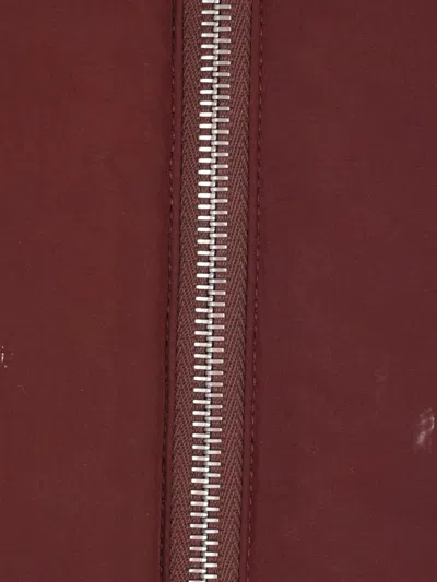 Jil Sander High Neck Hooded Padded Vest In Burgundy