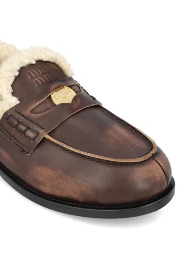 Miu Miu Bleached Leather And Shearling Penny Loafers In Brown