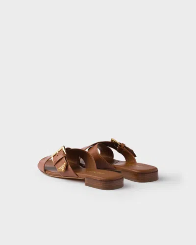 Prada Leather Crisscross Slides With Buckle Shoes In Brown