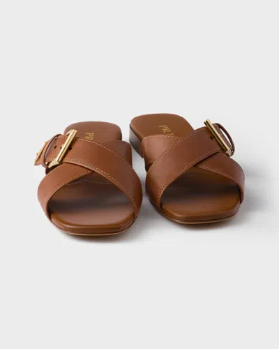 Prada Leather Crisscross Slides With Buckle Shoes In Brown