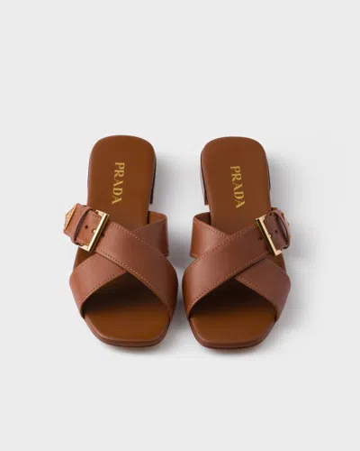 Prada Leather Crisscross Slides With Buckle Shoes In Brown