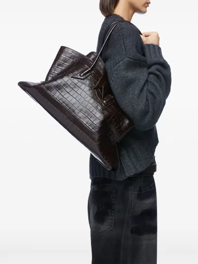 Attico La Passegiata Medium Asymmetric Croc-effect Leather Tote In Black