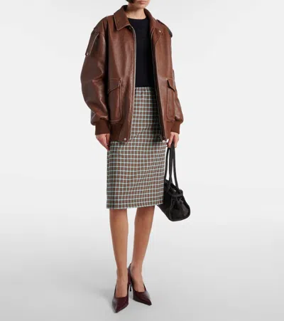 Prada Wool And Silk-blend Sweater In Black