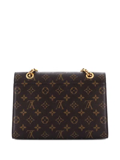 Pre-owned Louis Vuitton Victoire Handbag Monogram Canvas And Leather Shoulder Bag In Brown