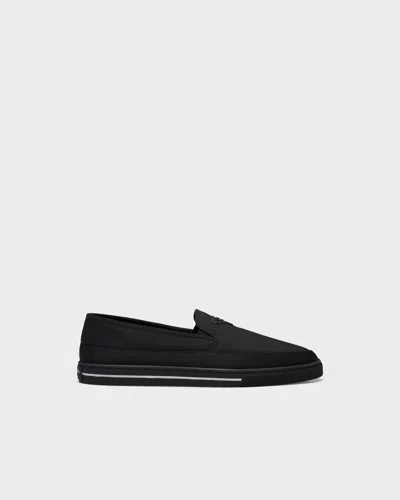 Prada Re-nylon Embossed Logo Slip-on Trainers In Animal Print