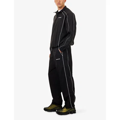 Awake Ny Mens Logo-embroidered Relaxed-fit Shell Track Pants Black In Black