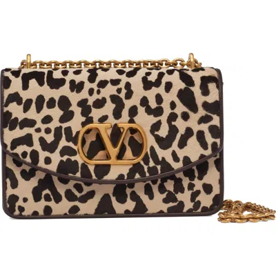 Valentino Garavani Vain Small Cow-print Leather And Calf-hair Shoulder Bag In Animal Print