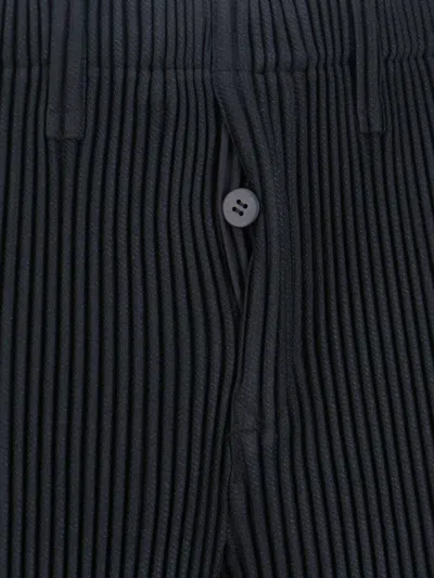 Issey Miyake Cropped Pleated Trousers For Modern Look In Black
